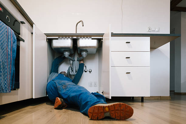 Professional Drain Cleaning technician working in Holbrook, MA